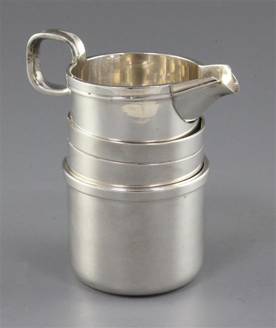 A 1970s Irish silver cream jug, sugar bowl and beaker by Rionore or Kilkenny Ltd, 12.5 oz.